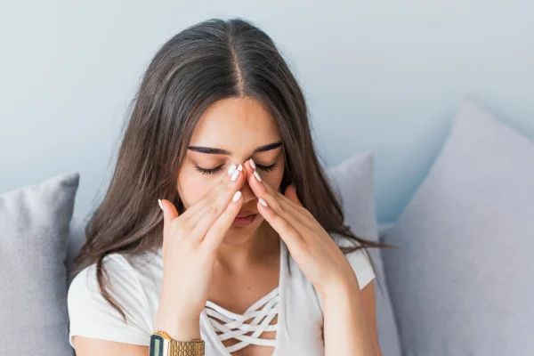 compresa caliente para el dolor de cabeza sinusal